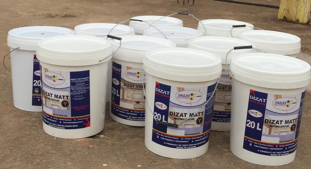Stacked 20 litre buckets of Dizat Matt and Dizat Vinyl paint ready for site delivery