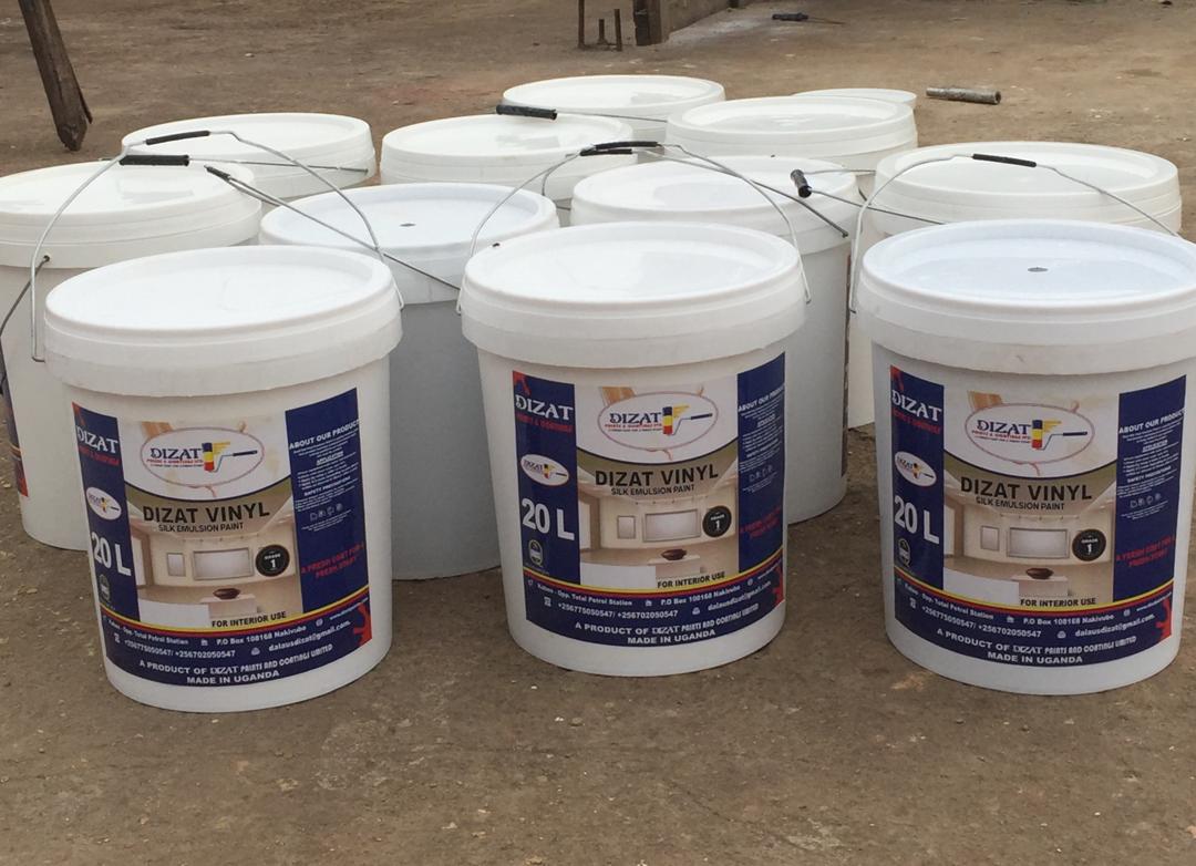 Dizat Vinyl silk emulsion 20 litre buckets lined up at a project site