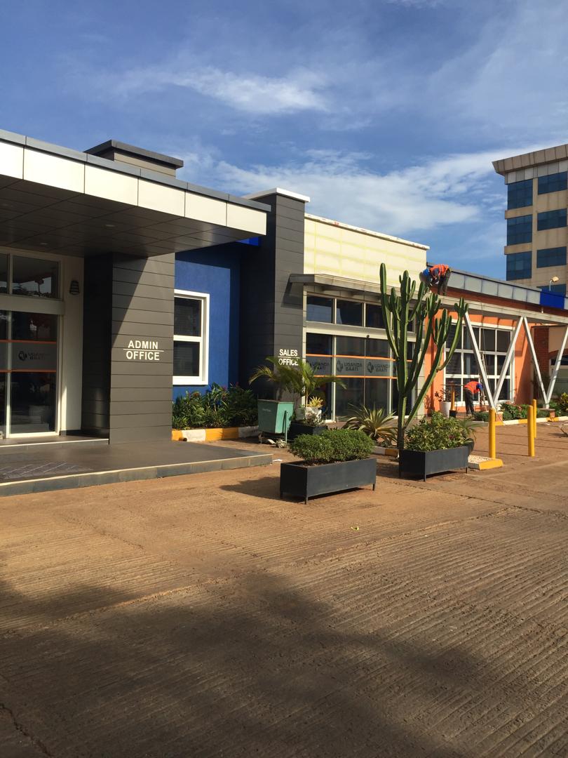 Uganda Baati admin and sales office entrance finished in charcoal grey cladding tones